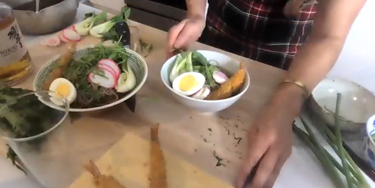 Candice Kumai decorates bowl of soba noodles